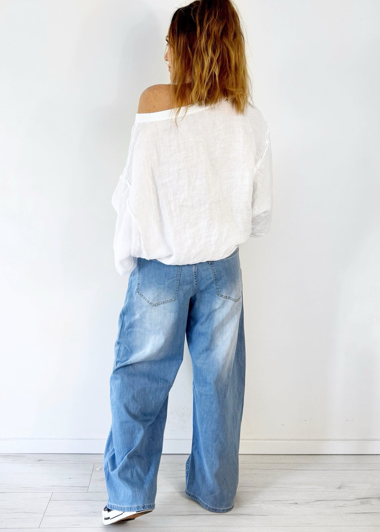 Lange wide leg Glitzer Jeans